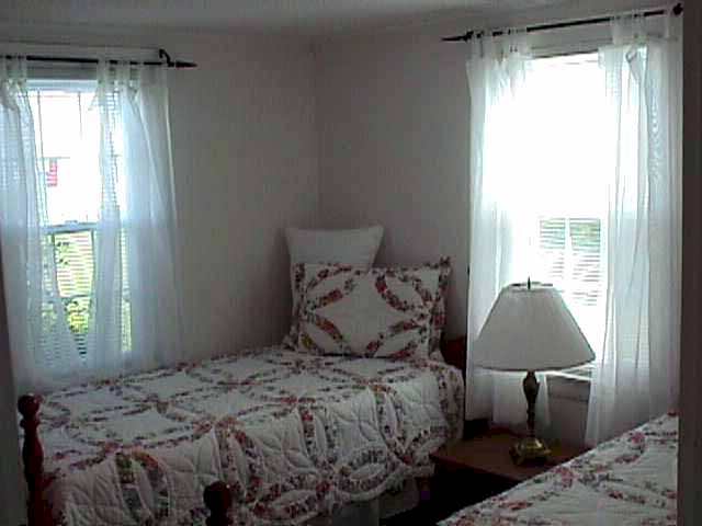 Bedroom with two twin beds.