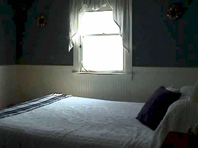 Master bedroom, queen size bed.