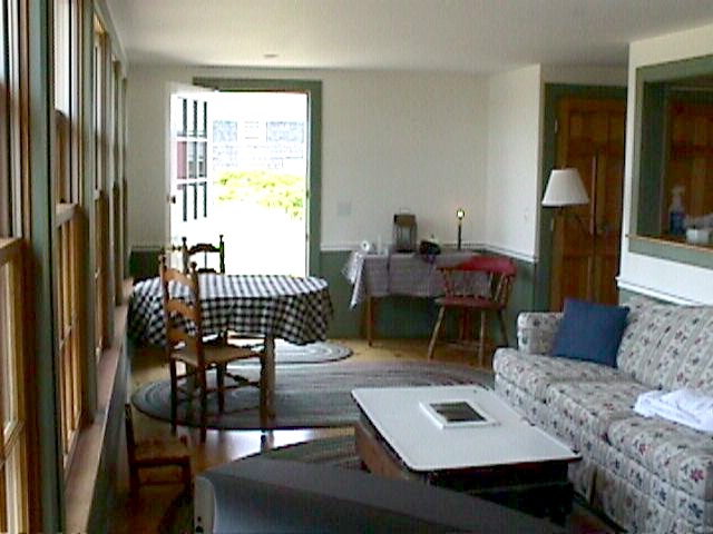 A new livingroom with views of the bay and plenty of room to spread out and relax.
